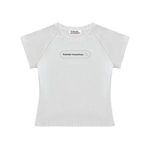 May include: White short-sleeved t-shirt with a crew neck and raglan sleeves. The shirt features the text "homer muumuu" inside a search bar graphic. The brand name "tracey eminem" is printed above the neckline.