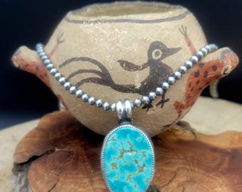 Handmade Tyrone Turquoise and Sterling Silver Pendant with 24" Sterling Chain.