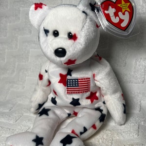Rare TY GLORY 1997 Beanie Baby is an excellent addition to your collection