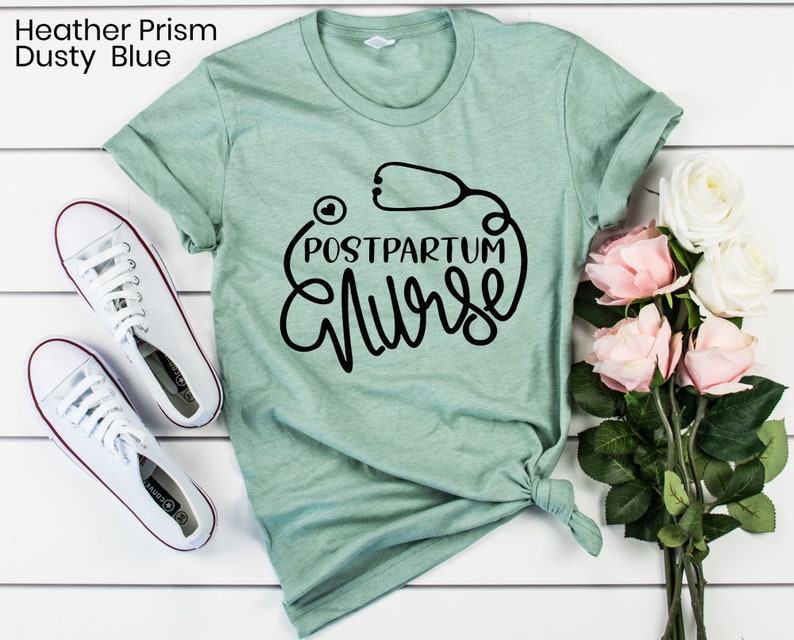 May include: A light green t-shirt with the text "POSTPARTUM NURSE" in black lettering. A stethoscope is drawn around the text.