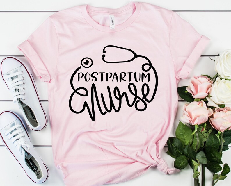 May include: Pink t-shirt with a black graphic of a stethoscope and the text "Postpartum Nurse".