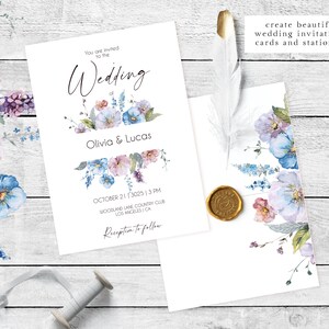 May include: A wedding invitation with a watercolor floral design in shades of blue and pink. The invitation reads "You are invited to the Wedding of Olivia & Lucas" and includes the date, time, and location of the wedding. The text "Reception to follow" is also included.