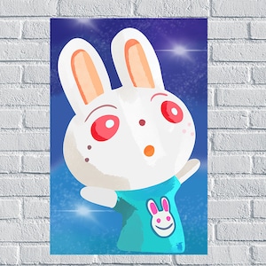 May include: A whimsical illustration of a white rabbit with red eyes and orange ears, wearing a turquoise shirt with a smiling bunny graphic. The background is a gradient of blue with white sparkles.