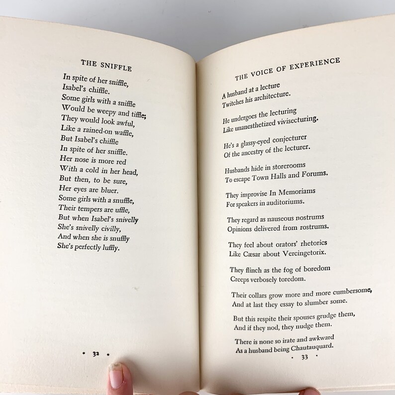 May include: A page from a book of poetry with two poems titled "The Sniffle" and "The Voice of Experience". The poems are printed in black ink on white paper. The poems are about the common cold and the experience of being a husband.