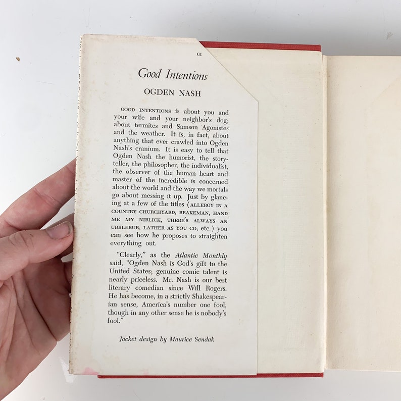 May include: A book cover with a red background and white text. The title of the book is "Good Intentions" by Ogden Nash. The text on the back cover describes the book as a collection of humorous essays about everyday life.