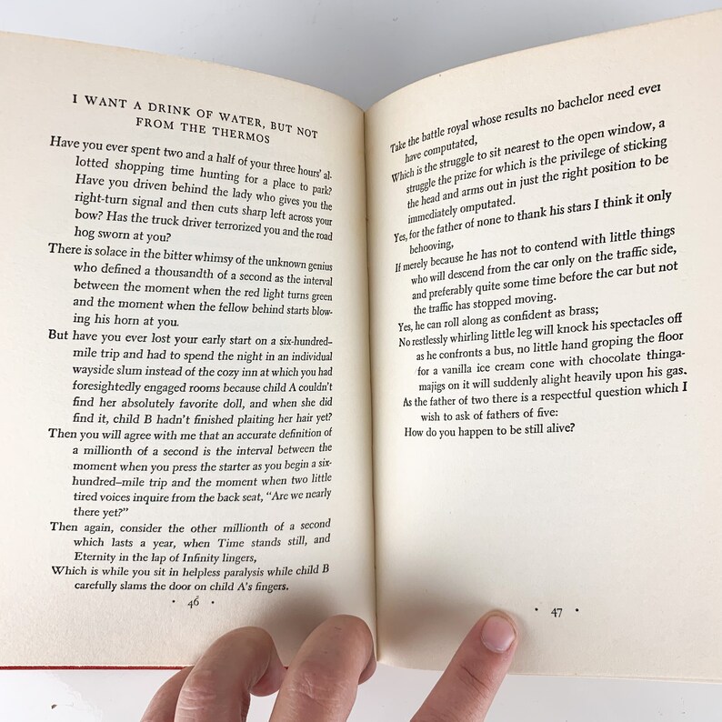 May include: Open book with white pages and black text. The book is open to pages 46 and 47. The text on page 46 discusses the concept of time and the passage of time. The text on page 47 discusses the challenges of being a father of five.