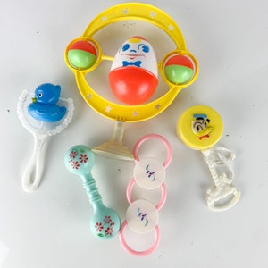5 Vintage Hard Plastic Baby Children&#39;s Rattle Toys Disney Donald Duck Humpty