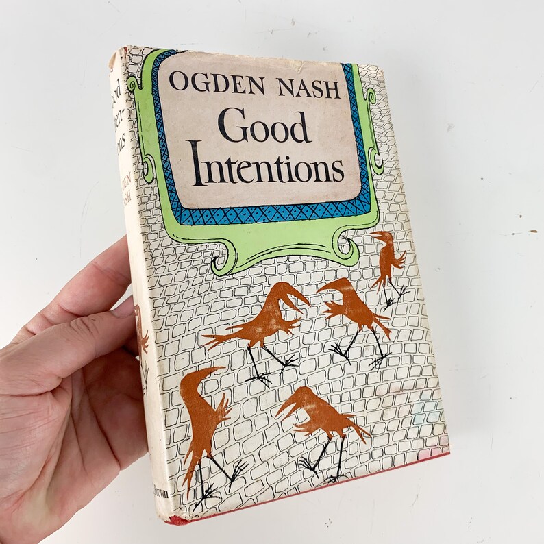 May include: A vintage hardcover book titled "Good Intentions" by Ogden Nash. The cover features a green and blue illustration of a brick wall with five stylized birds in orange.