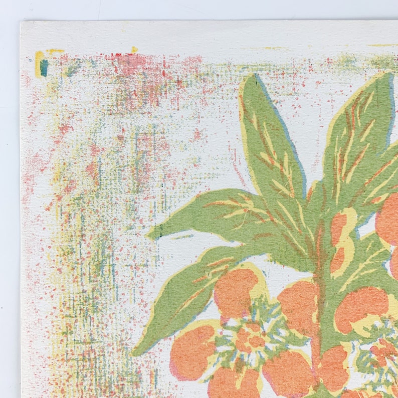 May include: A vintage floral print with orange flowers and green leaves on a white background. The print has a textured, distressed look.