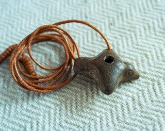 Andean ceremonial shamanic whistle in the shape of a bird