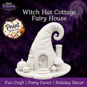 May include: A white ceramic fairy house shaped like a witch hat with a curved top, a heart-shaped window on the door, a chimney, two pumpkins, and two mushrooms on the base. The text reads Witch Hat Cottage Fairy House and Paint Your Own.