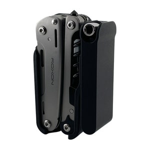 May include: A black multi-tool with a silver blade and a black case. The multi-tool has a spring-loaded mechanism and a variety of tools, including a knife, a screwdriver, and a bottle opener. The case has a snap closure and a belt loop.