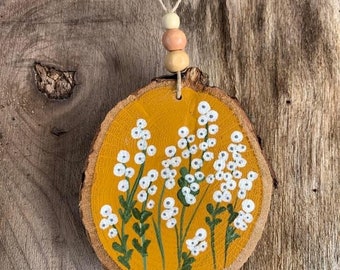 painted wooden disk