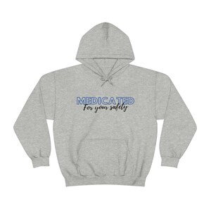 Sudadera con capucha Unisex Heavy Blend - MEDICATED