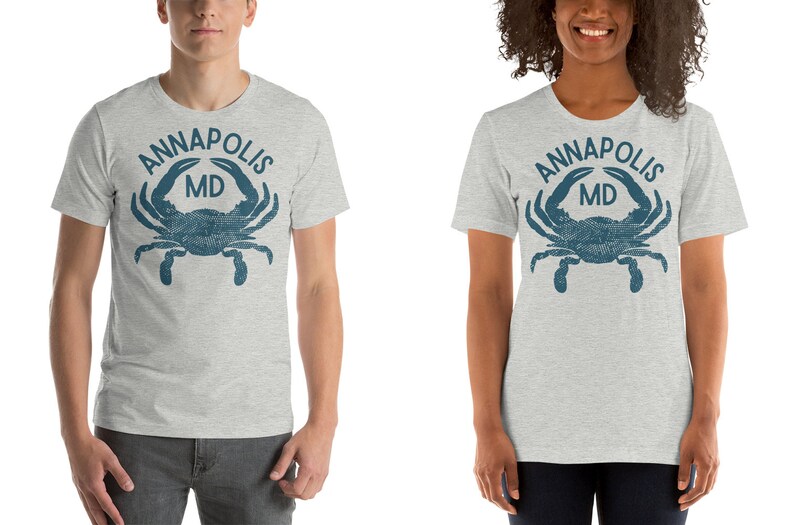 May include: Gray t-shirt with a blue crab and the text "ANNAPOLIS MD" printed on the front.