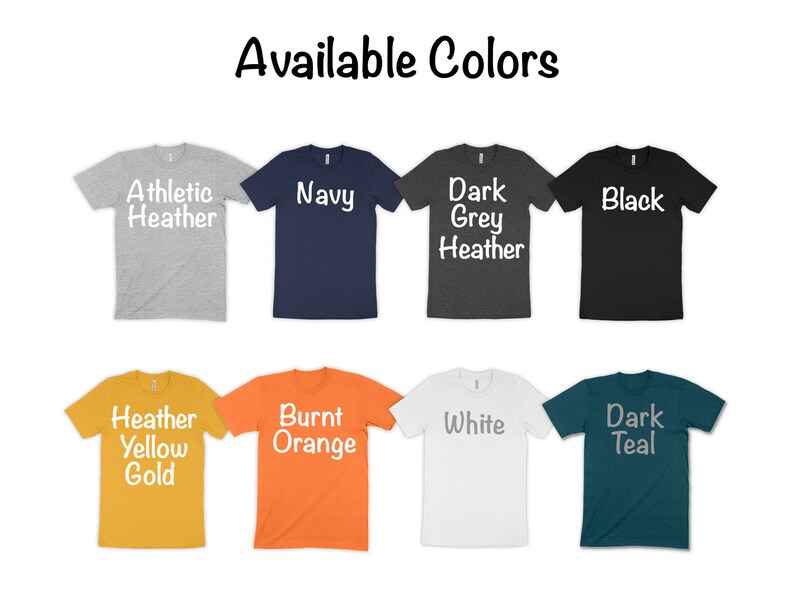 May include: A selection of t-shirts in various colors, including athletic heather, navy, dark grey heather, black, heather yellow gold, burnt orange, white, and dark teal. The t-shirts are all short-sleeved and have a crew neck.
