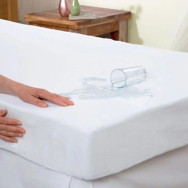 Surmatelas en coton imperméable. Surmatelas bio, sans polyester. Couvre-lit déperlant taille sur mesure. Grand lit, lits jumeaux, très grand lit