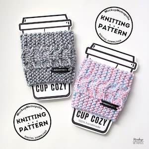May include: Two knitted cup cozies, one gray and one pink and blue, sit on white paper cutouts shaped like coffee cups. The text "KNITTING PATTERN DIGITAL DOWNLOAD" is in a circle above each cup. Each cozy has a label that says "SAIDONIA & CO" and "CUP COZY".