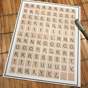 May include: A white sheet of paper with a grid of squares containing letters and numbers. Each square has a letter or number printed in black, and some squares have a subscript number. The letters are arranged in alphabetical order, and the numbers are arranged in numerical order.
