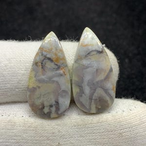 Coppia di pietre preziose naturali a forma di ragnatela, cabochon a forma di pera, sfuse, per orecchini, 13x27x3 mm, 25 carati.