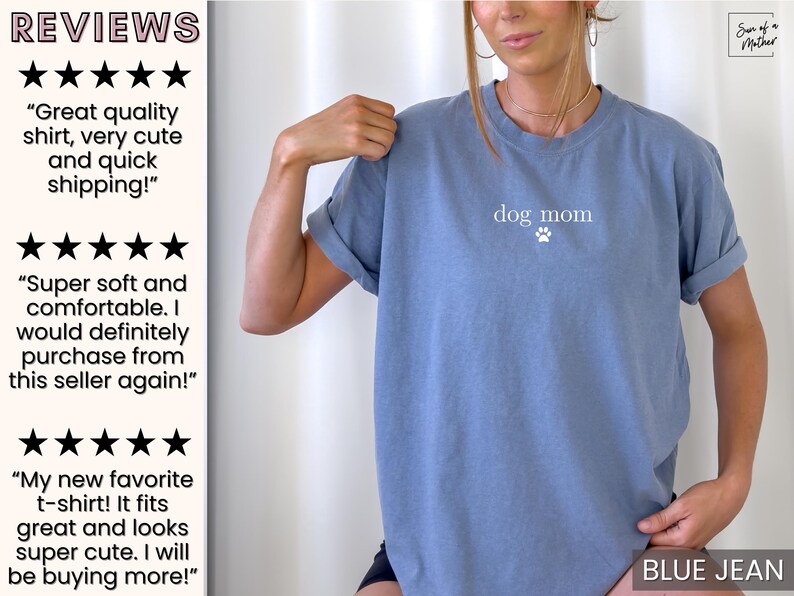 May include: A blue jean t-shirt with the text "dog mom" and a paw print in white.