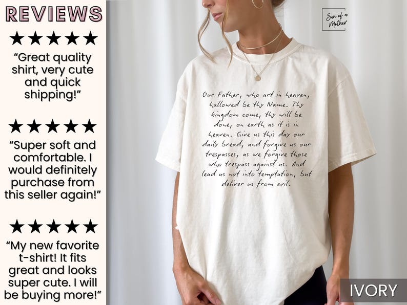 May include: A white t-shirt with the Lord's Prayer written in black ink. The shirt is a relaxed fit and has a crew neck. The text "IVORY" is visible in the bottom right corner of the image.