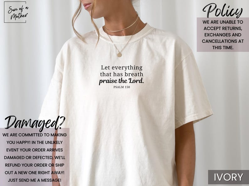 May include: Ivory-colored t-shirt with the text "Let everything that has breath praise the Lord." in black. The shirt also features the text "PSALM 150". The shirt is a relaxed fit and has short sleeves. The brand logo "Sun of a Mother" is visible.