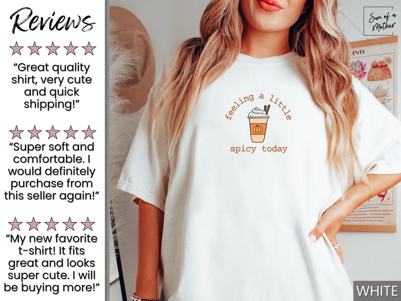 May include: White t-shirt with a fall-themed graphic. The design features a coffee cup with whipped cream, a cinnamon stick, and a pumpkin, with the text "feeling a little spicy today".