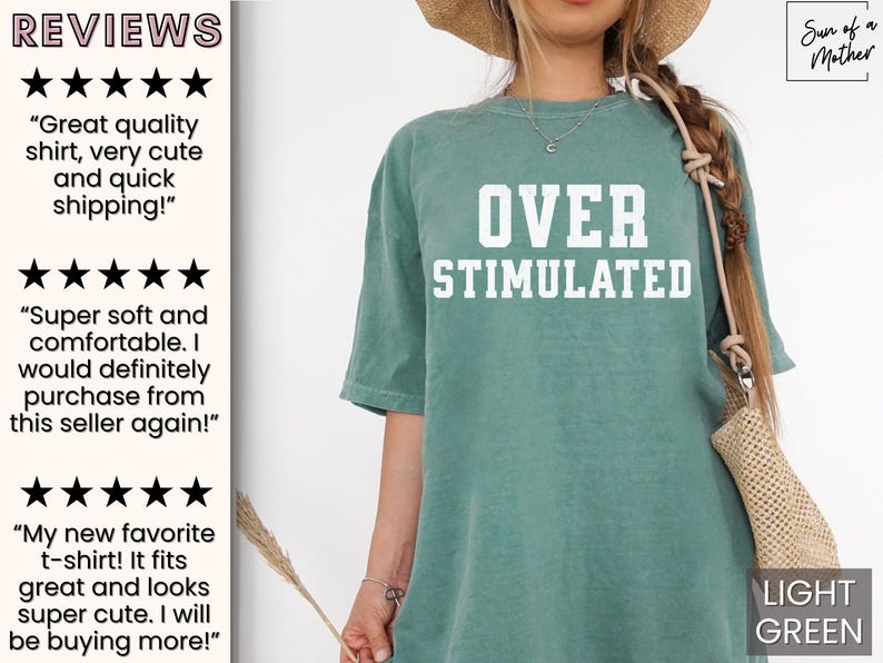 May include: A light green t-shirt with the text "OVER STIMULATED" in white. The shirt is made of a soft, comfortable material and is perfect for everyday wear.