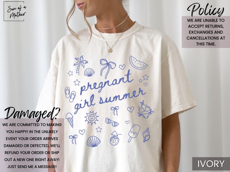 May include: Ivory-colored t-shirt with blue summer-themed graphics and the text "pregnant girl summer." The design includes a palm tree, seashells, bows, and a watermelon slice. The shirt is a relaxed fit.