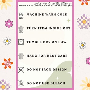 May include: A pink and white care instruction card with icons and text. The text reads: "care and instructions", "MACHINE WASH COLD", "TURN ITEM INSIDE OUT", "TUMBLE DRY ON LOW", "HANG FOR BEST CARE", "DO NOT IRON DESIGN", "DO NOT USE BLEACH".