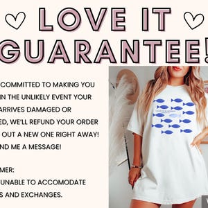 May include: White oversized t-shirt with a blue fish graphic and the text "I claim this moment for myself". The shirt is shown on a model with long brown hair. The text "Love it Guarantee!" is at the top of the image. The text "Sun of a Mother" is in the top right corner of the image. The text "White" is in the bottom right corner of the image.