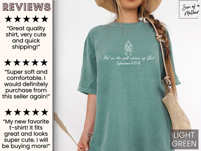 Puede incluir: Una camiseta verde claro con el texto "Put on the full armor of God Ephesians 6:10-18" en blanco. La camiseta presenta un peque&ntilde;o gr&aacute;fico de una persona con armadura.