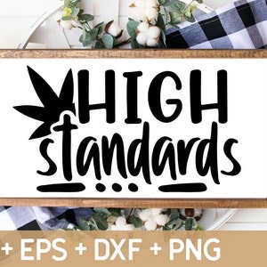 May include: A wooden sign with a black and white graphic of a marijuana leaf and the text "HIGH standards".