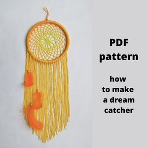 May include: A yellow and orange crochet dream catcher with feathers. PDF pattern included. How to make a dream catcher.