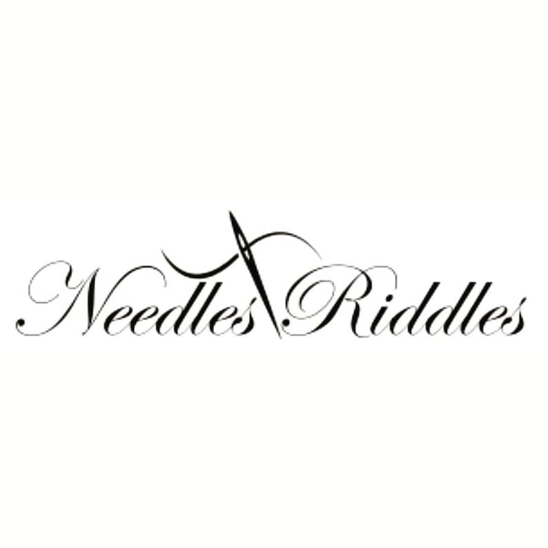 May include: Black and white logo for a business called "Needles & Riddles". The logo features a stylised needle and thread.