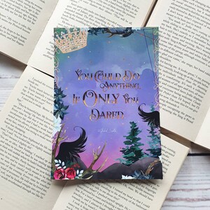 May include: Purple and pink inspirational quote card with gold lettering that reads "You could do anything if only you dared." The card features a black raven with a crown on its head and a forest scene in the background.