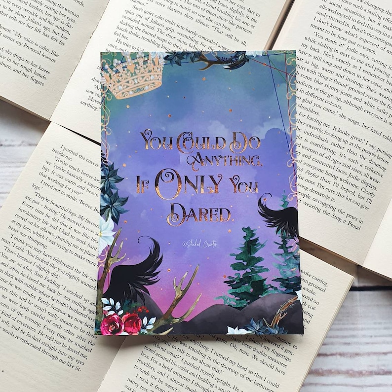 May include: Purple and pink inspirational quote card with gold lettering that reads "You could do anything if only you dared." The card features a black raven with a crown on its head and a forest scene in the background.