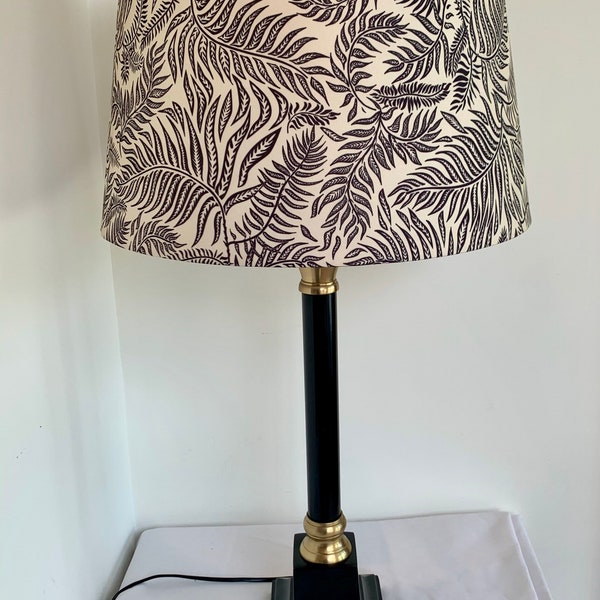 Vintage style black column table side lamp with gold accents and fern leaf design shade