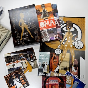 Delta Integral - Coffret Carton avec les 2 tomes + Dedicace + Poster + Cellulo + 2 Cartes Missions + CD (4 disponibles)