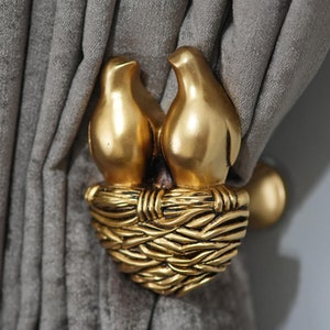 Fermatende a forma di uccellino dorato: coppia di nidi, decorazione per la casa (set da 2)
