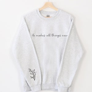 minimalist christian sweatshirt he makes all things new faith based aesthetic sweatshirt women christian butterfly on sleeve sweatshirt