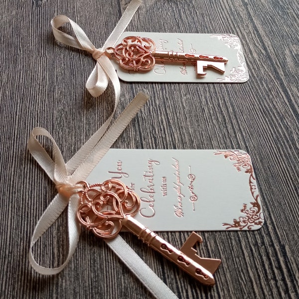 25 Rose Gold Key Bottle Opener Wedding Favor, Rose Gold Foil Tag & Light Peach Color Ribbon. Favors for Guests. Unassembled. No Customize.