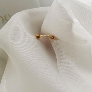 Gold pearl ring