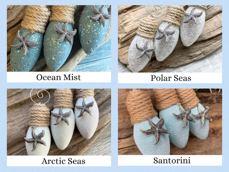 May include: Four sets of lightbulb ornaments decorated with twine and glitter. Each set has a different color scheme: Ocean Mist (blue), Polar Seas (white), Arctic Seas (white), and Santorini (blue). Each ornament features a silver starfish.