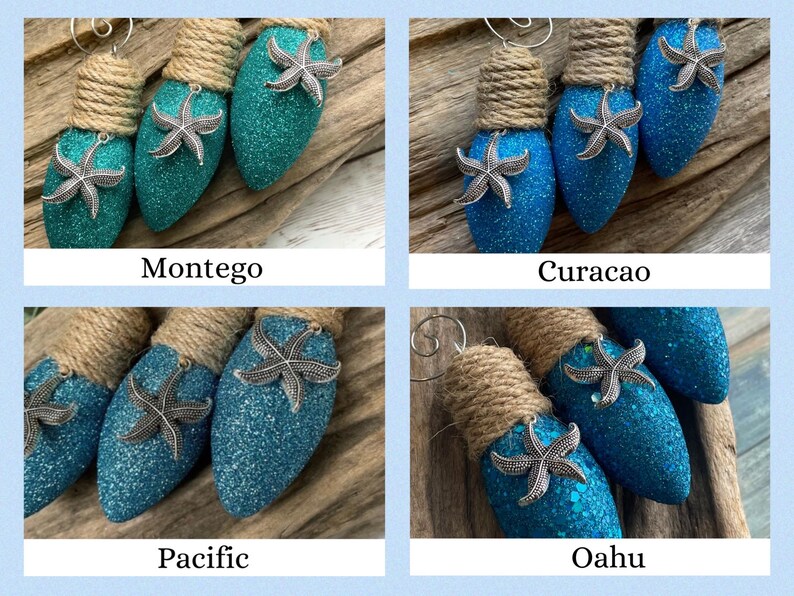 May include: Four teal blue lightbulb ornaments with silver starfish accents and brown twine. The ornaments are labeled "Montego", "Curacao", "Pacific", and "Oahu".
