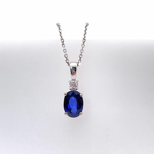 Dainty Blue Sapphire Pendant in Solid 14K White Gold with Diamond Accent | Oval 7x5mm Gem | Earth-Mined | Libra | Customizable