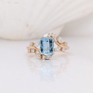 Santa Maria Aquamarine Ring in Solid 14K Yellow Gold with Natural Diamond Accents | Emerald Cut 7x5mm | March Birthstone