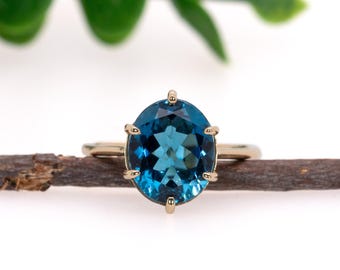 London Blue Topaz Ring in Oval Setting 12x10mm in 14k White Gold, Rose Gold, and Yellow Gold / London Blue Topaz / December Birthstone