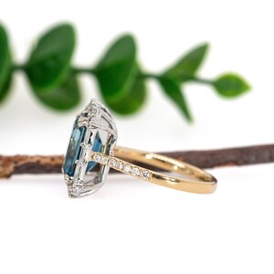 11x9mm 5.45cts London Blue Topaz and Earth Mined Diamonds Ring in 14k Dual Gold
